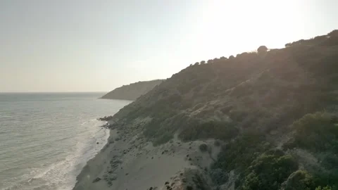 Flyover Crete Beach During Sunset Aerial Footage Stock Footage 249679747