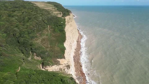 Flyover Drone Shot of Cliffs in Hastings, England Stock Footage 303282316