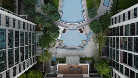 Flyover of empty swimming pool under renovation Stock Footage 143392218