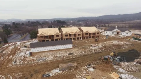 Flyover house construction site in winter Stock Footage 71697810
