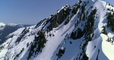 Flyover Jagged Mountain Crevice Stock Footage 91374667