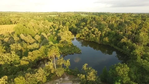 Flyover a lake in south of france Stock Footage