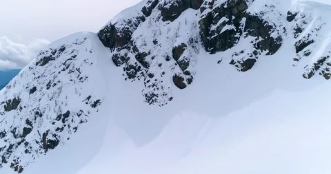 Flyover Mountain Peak to Expose Mountain Landscape Stock Footage 91380248