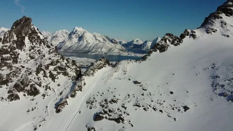 Flyover of Mountains in Winter 動画素材 242829472
