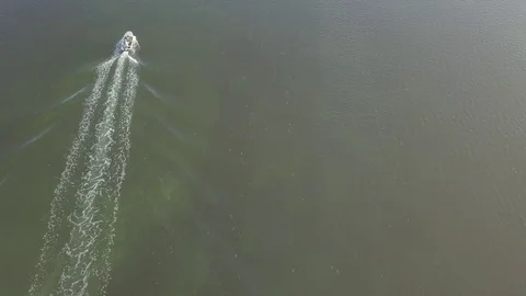 Flyover Ocean View of the Florida Keys of a Small Motorboat Stock Footage 85628963
