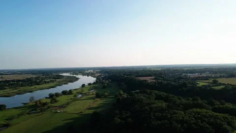 Flyover Oderwiesen near Lebus during day with river, meadows and trees Stock Footage 161075131