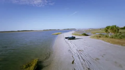Flyover Pickup At Beach Stock Footage 8974074
