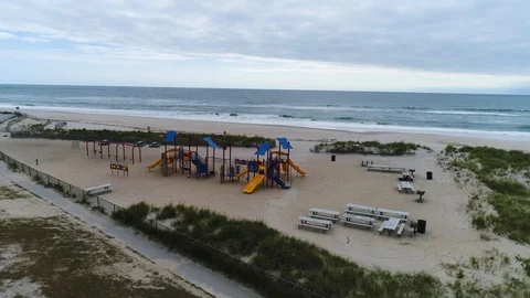 Flyover playground on beach Stock Footage 102790993