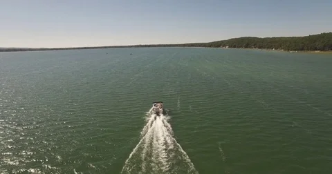 Flyover Pontoon Boat in Lake Stock Footage