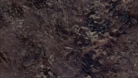 Flyover rocky woods Stock Footage 72406113