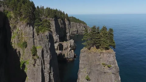 Flyover the rough Newfoundland rough coast in the North Atlantic in Canada. Stock Footage 315639230