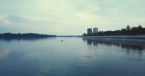 Flyover rowers on river Stock Footage 106186292