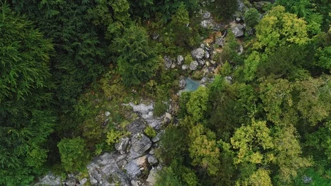 Flyover shot of dried up mountain river in the forest near Olympus in Greece Stock Footage 87944606
