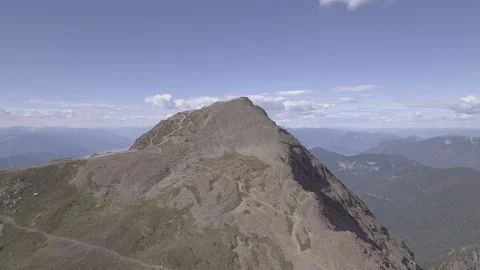 Flyover shot of a tip of the mountain, wide Stock Footage 90025812