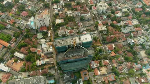 Flyover Skyscraper Construction shot with a drone Stock Footage 248781906