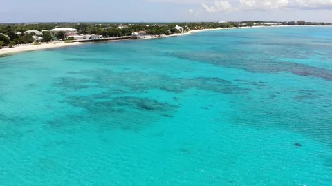 Flyover turquoise waters of West Bay Stock Footage 117942456