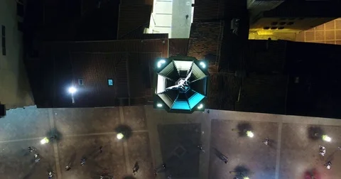 Flyover two headed eagle statue in Rijeka at night , birdsview Video stock 75925796