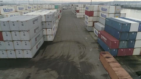 Flyover a Yard of Stacked Shipping Containers Stock Footage 208789747