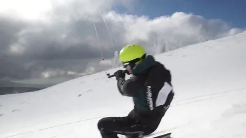 Flysurfer surfing in mountain slope Stock Footage 77805978
