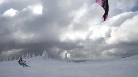 Flysurfer surfing in mountain slope Stock Footage 77805984