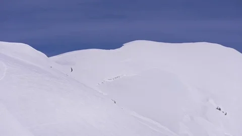 Flysurfer surfing in mountain slope Stock Footage 77806092