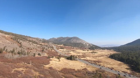 FlyThroughMountainMeadowRoad Video stock 103229862