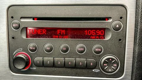 FM tuner inside car salon. Automobile equipment. Listening to music during car Stock Photos