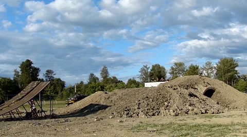 FMX 120fps slowmo, 3 riders Stock Footage 43503823