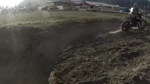 FMX helmet cam view of riders jumping Stock Footage 43489701