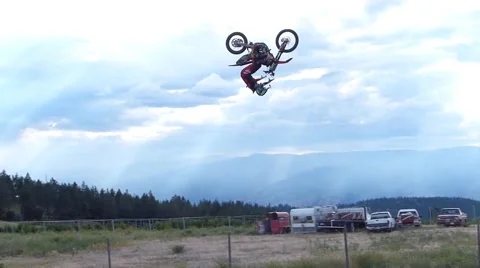 FMX professional backflip, cloudy day. Stock Footage 43485283