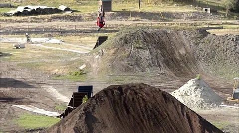 FMX professional backflip distant elevated view. Stock Footage 43485955