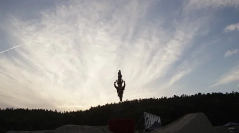 FMX Rider back flip heel clicker - Extreme Slow Motion Stock Footage 64698903