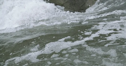 Foam and bubbles approach rapids in slow motion in Great Falls Park Stock Footage 91904630