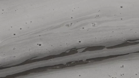 Foam and bubbles floating on water surface Vidéo 310409097