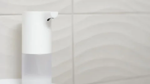 Foam from the Automatic Dispenser Stock Footage 130399429