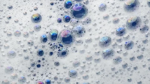Foam background. Liquid soap bubbles, Froth bubbles rotating backdrop. Soap foam Stock Footage 278654589