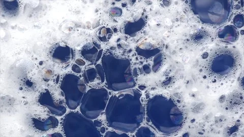 Foam background. Liquid soap bubbles, Froth bubbles rotating backdrop Stock Footage 281400576