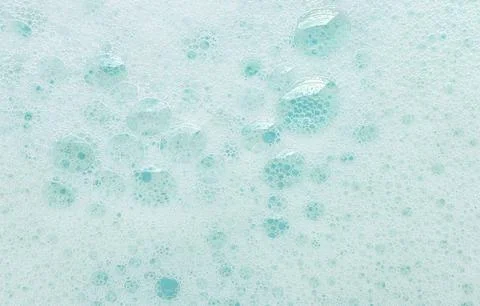 Foam background. shampoo Soap foam texture on water. Detergent foam bubble Stock Photos