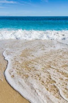 Foam on the beach Stock Photos