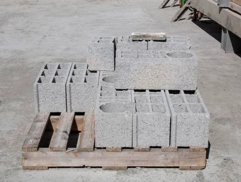 Foam blocks lie on pallets at the construction site Stock Photos