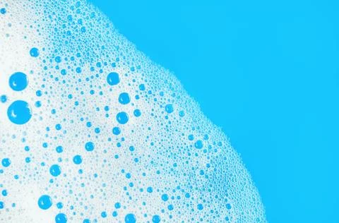 Foam on blue Stock Photos