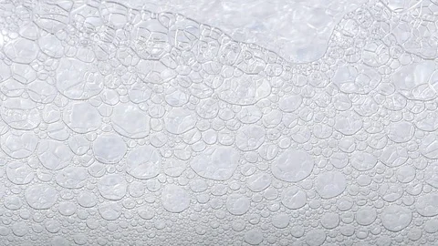 Foam blue texture soap bubbles on the water Stock Footage 87217220