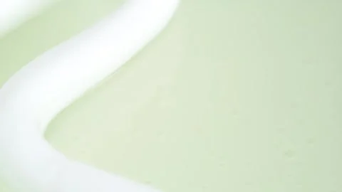 Foam bubble from soap or shampoo falling in the water. Soap foam texture su.. Stock Footage 271231913