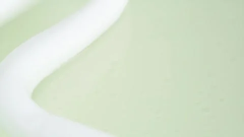 Foam bubble from soap or shampoo falling in the water. Soap foam texture su.. Stock Footage 274550501