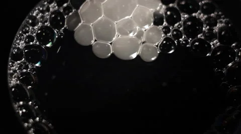Foam bubbles abstract black background Vidéo 54917905