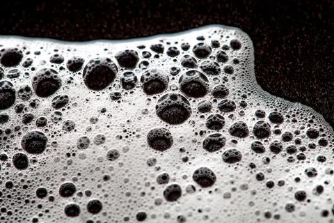 Foam bubbles abstract dark background Stock Photos