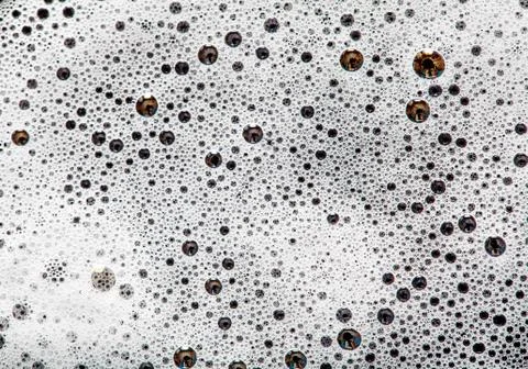 Foam bubbles abstract dark background Stock Photos