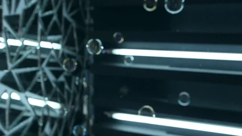 Foam bubbles fliing on neon mirror background. Abstract wonderfull background Stock Footage 123162128