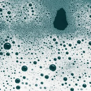 Foam with bubbles Foam with bubbles. Shampoo or detergent in water. Flat l... Stock Photos