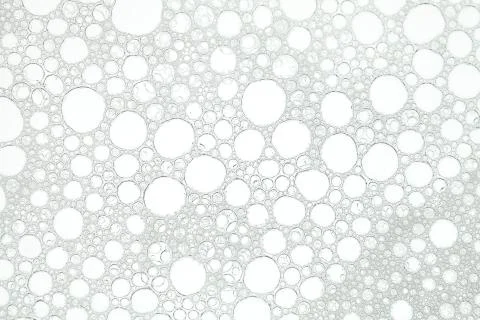 Foam bubbles white background Stock-Fotos
